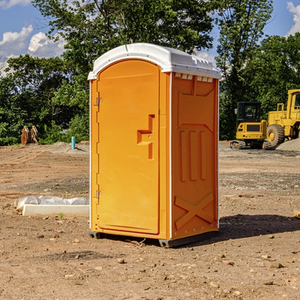 how often are the portable restrooms cleaned and serviced during a rental period in Wolf Lake MN